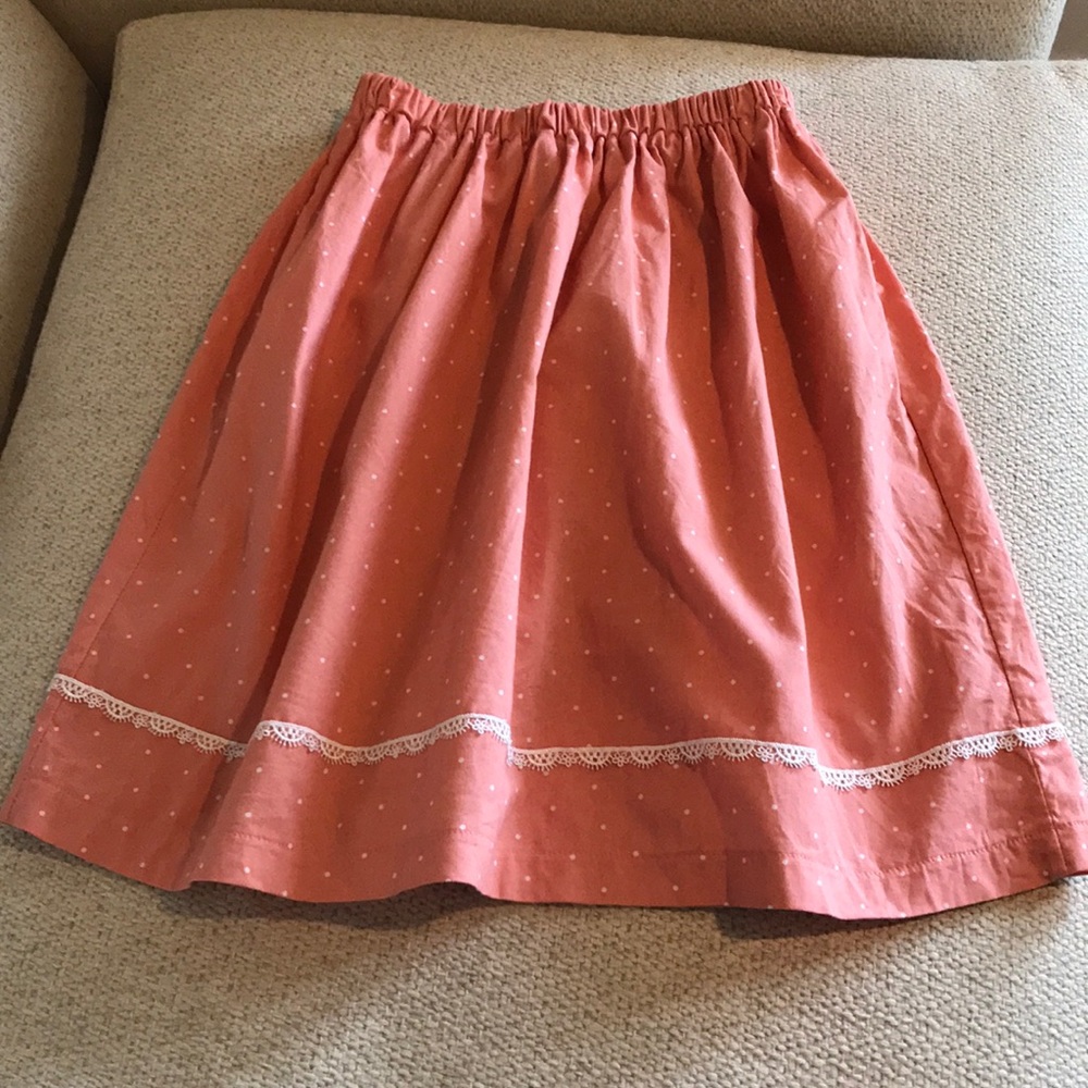 White and pink polka dot skirt